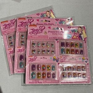 JoJo Siwa press on nail party packs. Three packs, four sets each.